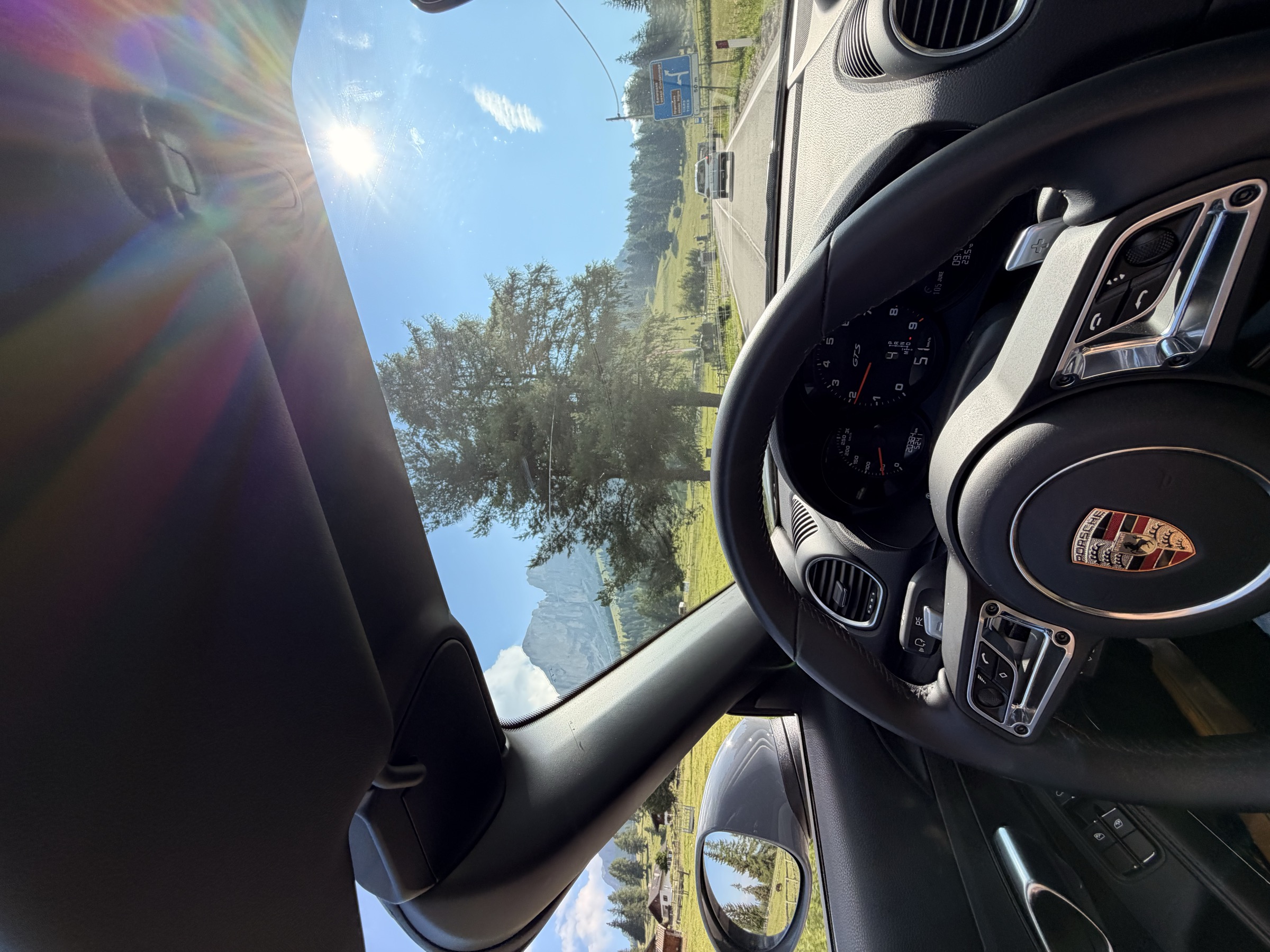 View from behind the wheel of the Porsche along the Great Dolomites Road